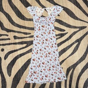 Baby blue midi dress with floral details